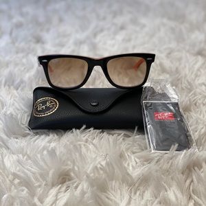 Ray Ban sunglasses.